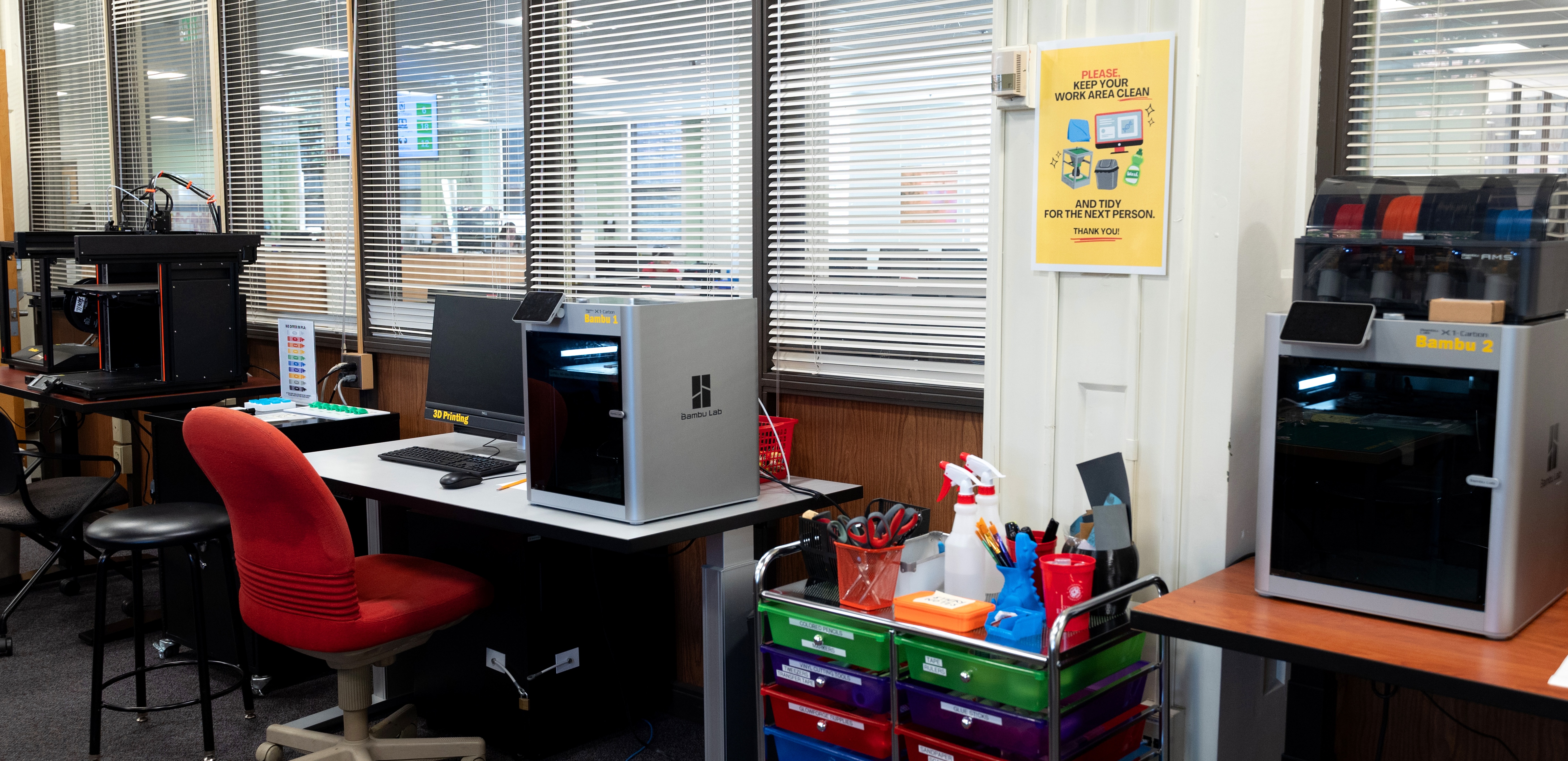 The UMD Libraries 3D printing station, equipped with Bambu Lab printers and supplies available for student use.