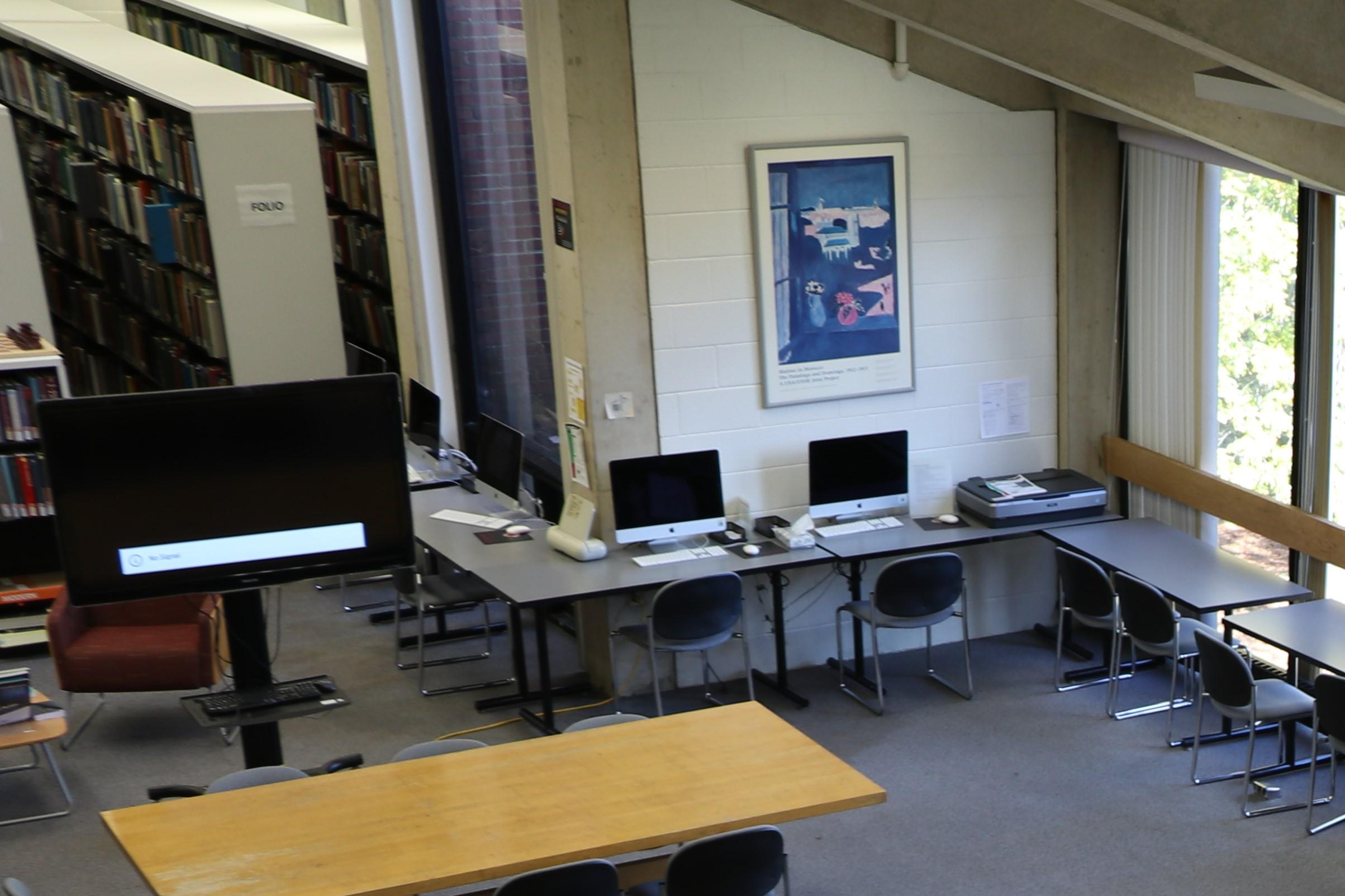 Interior of Architecture Library, with macs and scanner