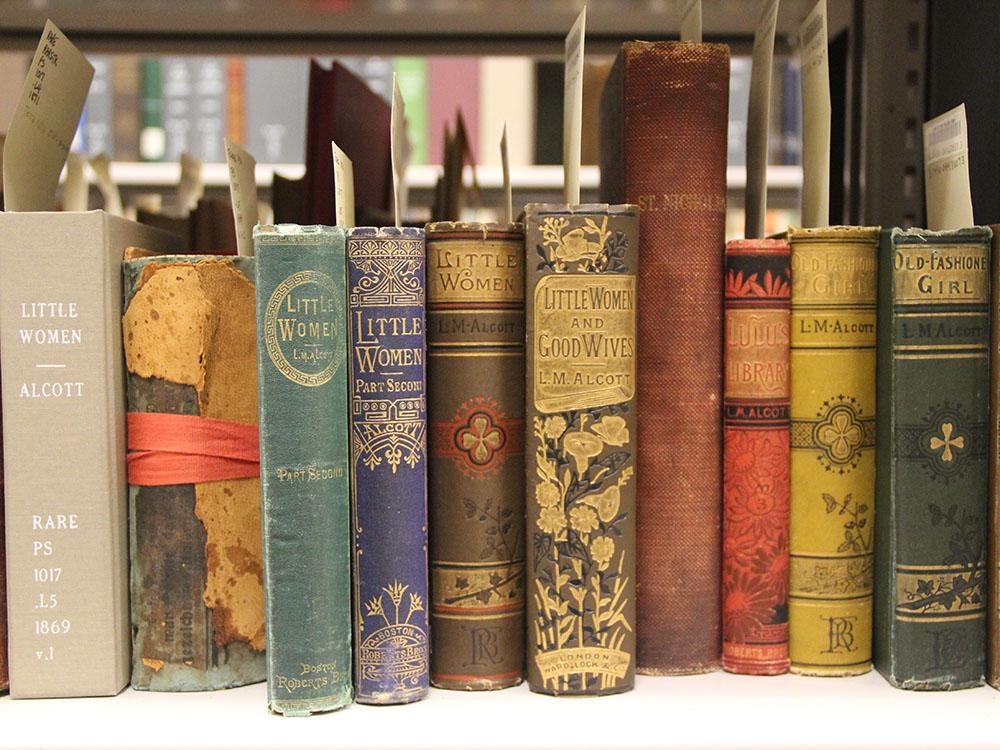 Shelf of rare books with decorated spines
