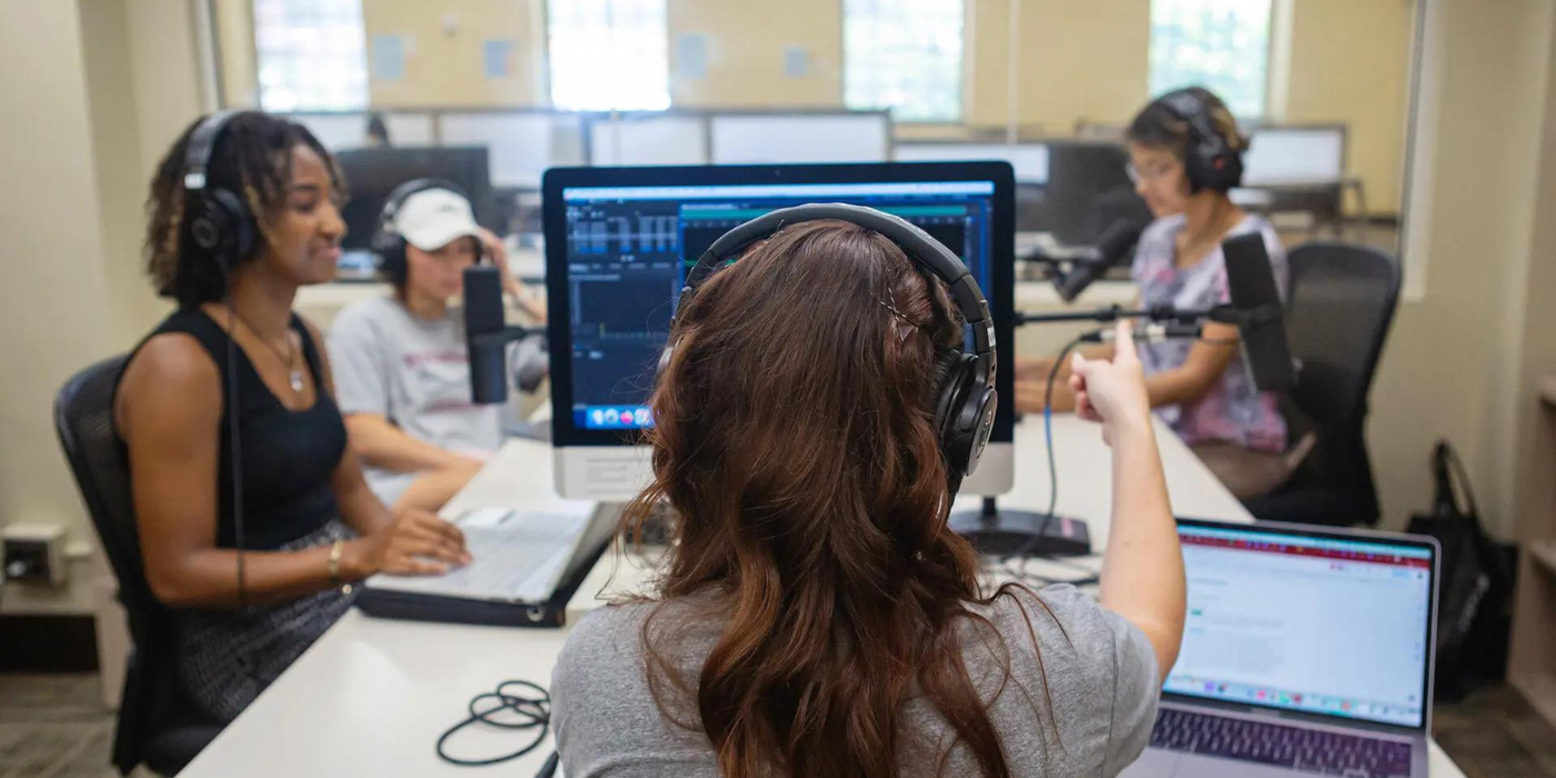 Students recording their podcast in McKeldin Library's Podcasting Lab.