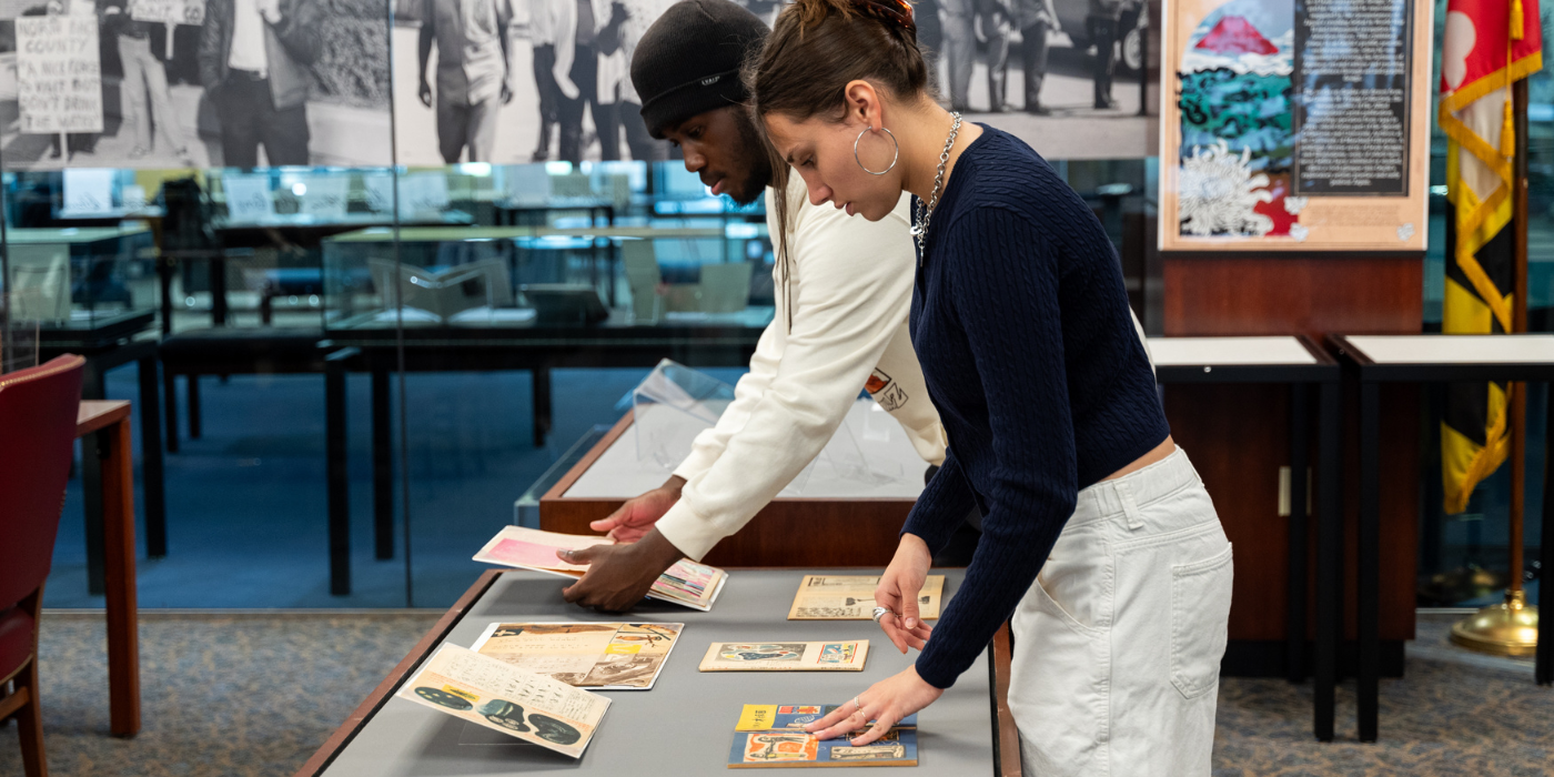 Students putting exhibition together in the Maryland Room.