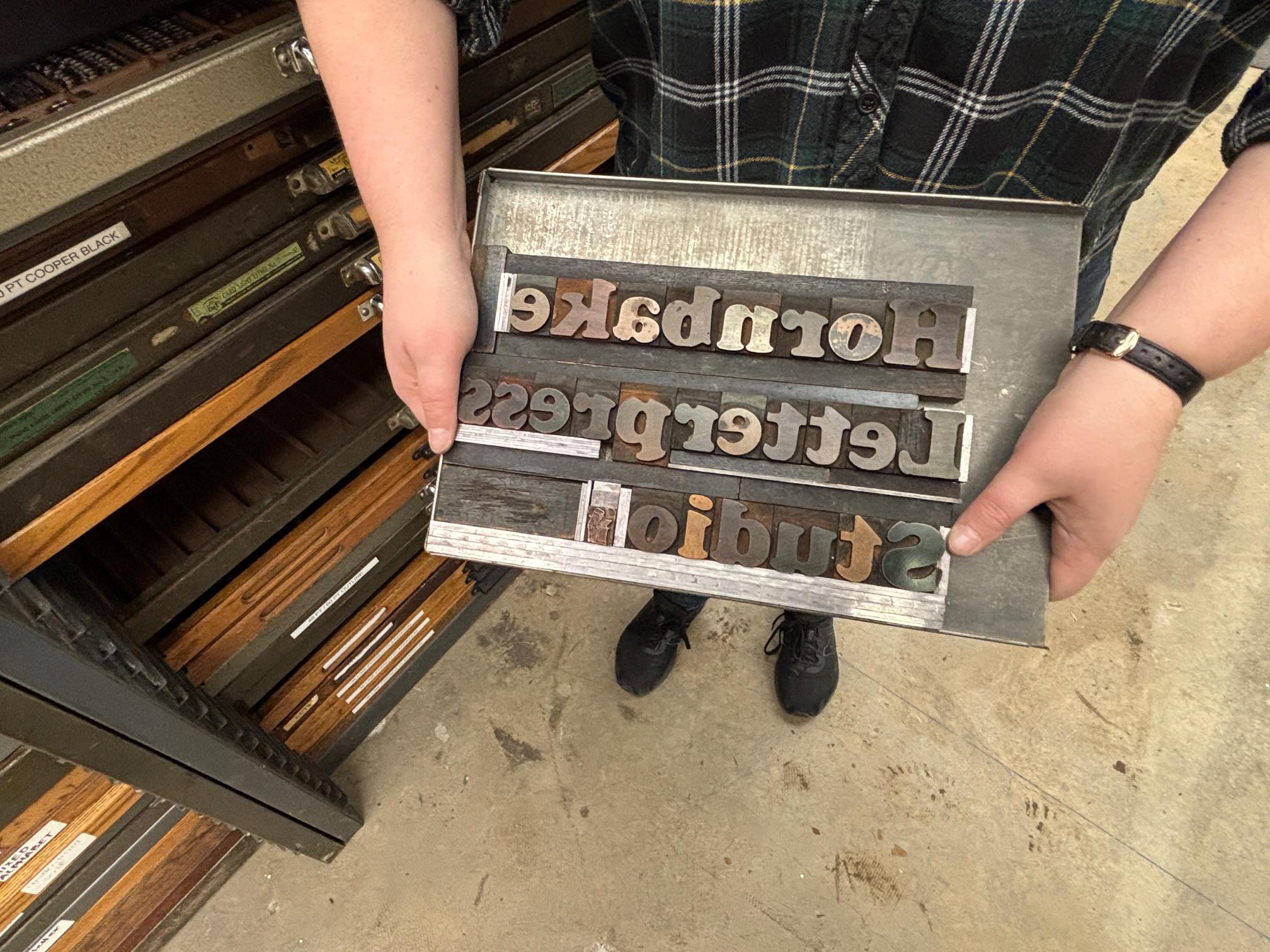 Galley with type spelling "Hornbake Letterpress Studio"