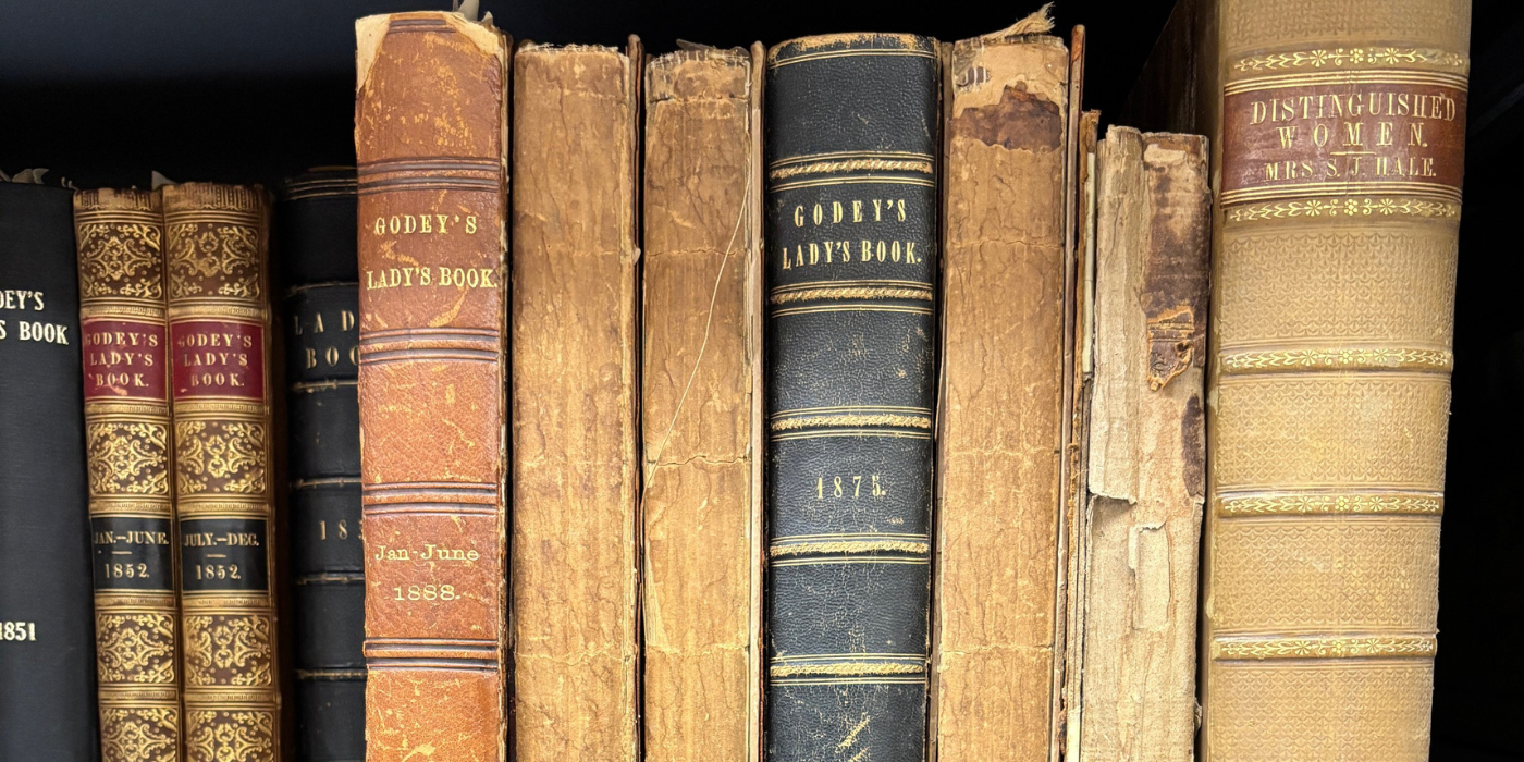 Books written by Sarah Josepha Hale on a shelf.